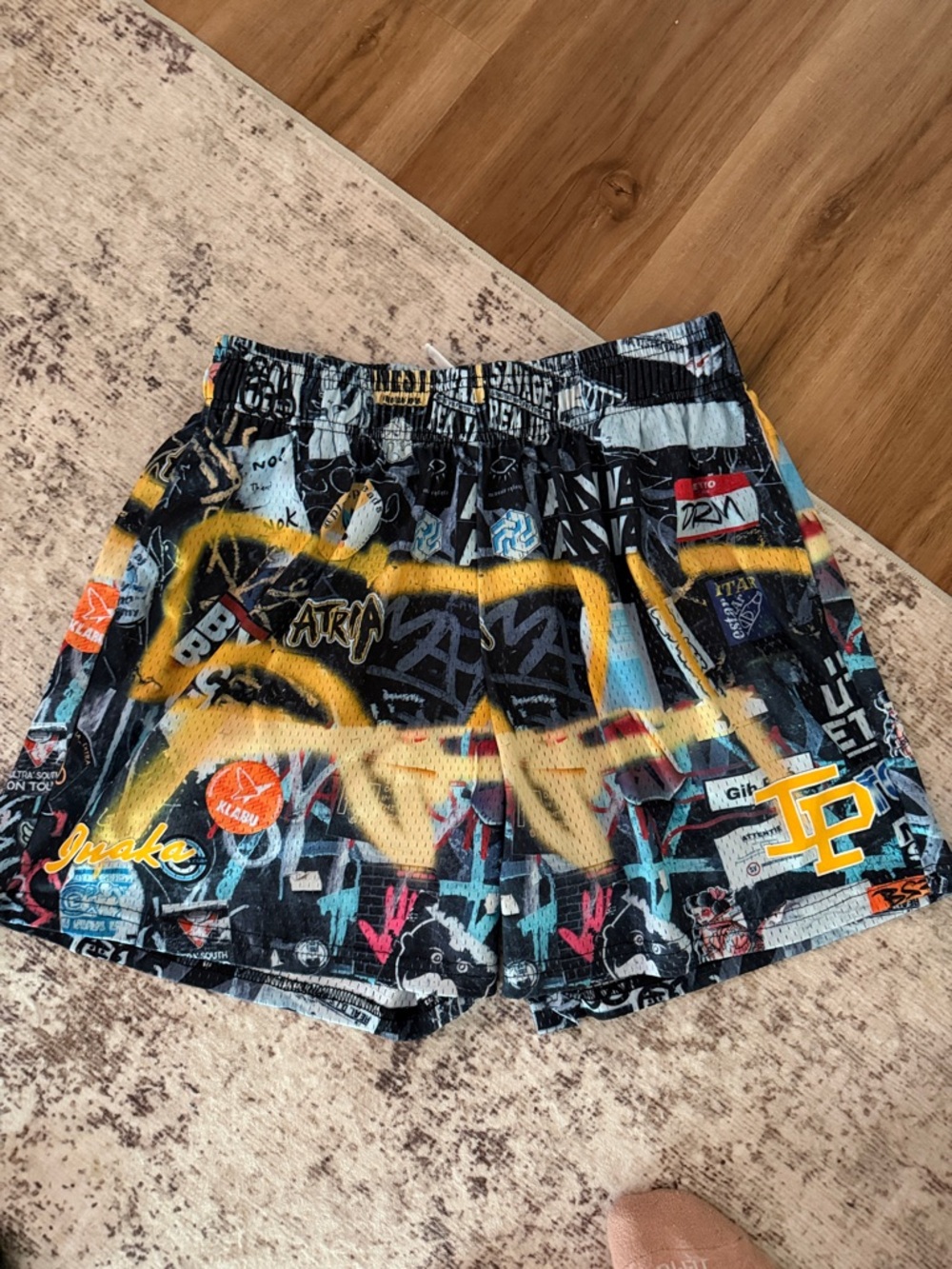 INAKA POWER Graffiti Print Athletic Shorts with Yellow Accent